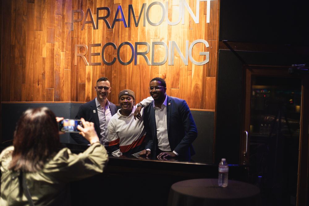 Guests taking photos under the Paramount Recording sign