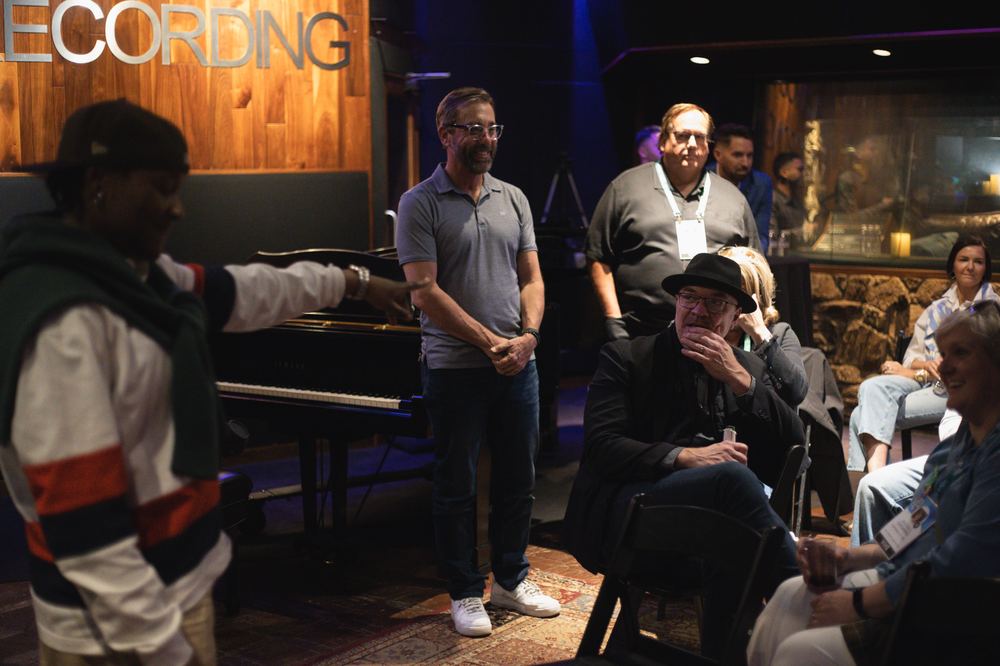 A songwriter at the piano